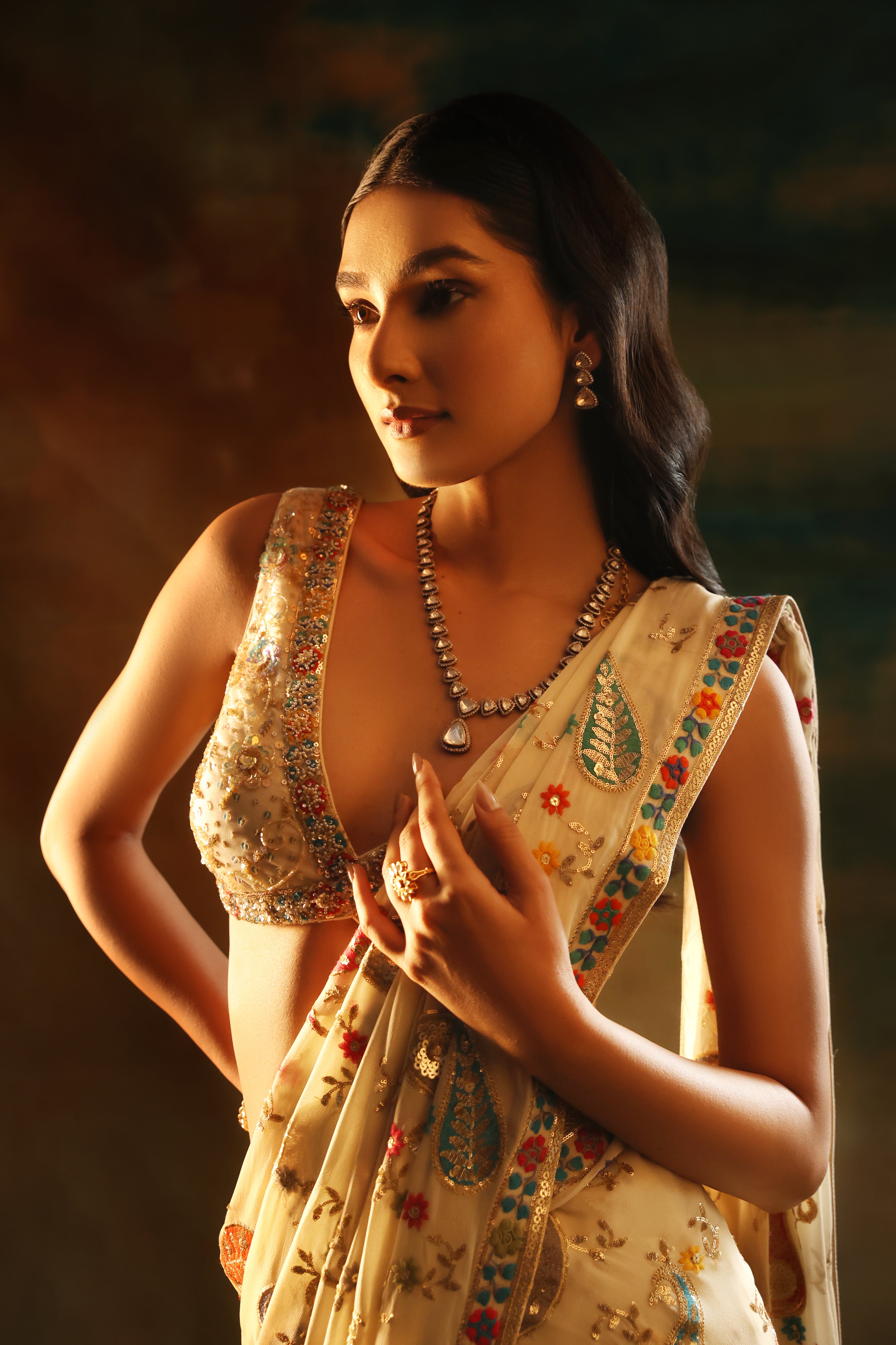 Ivory Embroidered Saree & Embellished Blouse