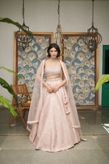Pink Net Sweetheart Neck Embellished And Woven Lehenga Set