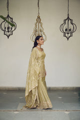 A sea green floral jaal adorned with delicate sequin embellishments.