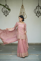 Lavender floral jaal gharara adorned with delicate sequin embellishments.