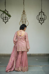Lavender floral jaal gharara adorned with delicate sequin embellishments.