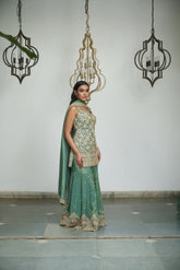 Sage green tissue with sequin, bead, resham & moti nature-inspired embellishments.
