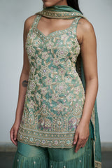 Sage green tissue with sequin, bead, resham & moti nature inspired embellishments.