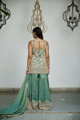 Sage green tissue with sequin, bead, resham & moti nature inspired embellishments.