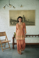 Rusty silk gharara set with sequin, zari & beadwork.