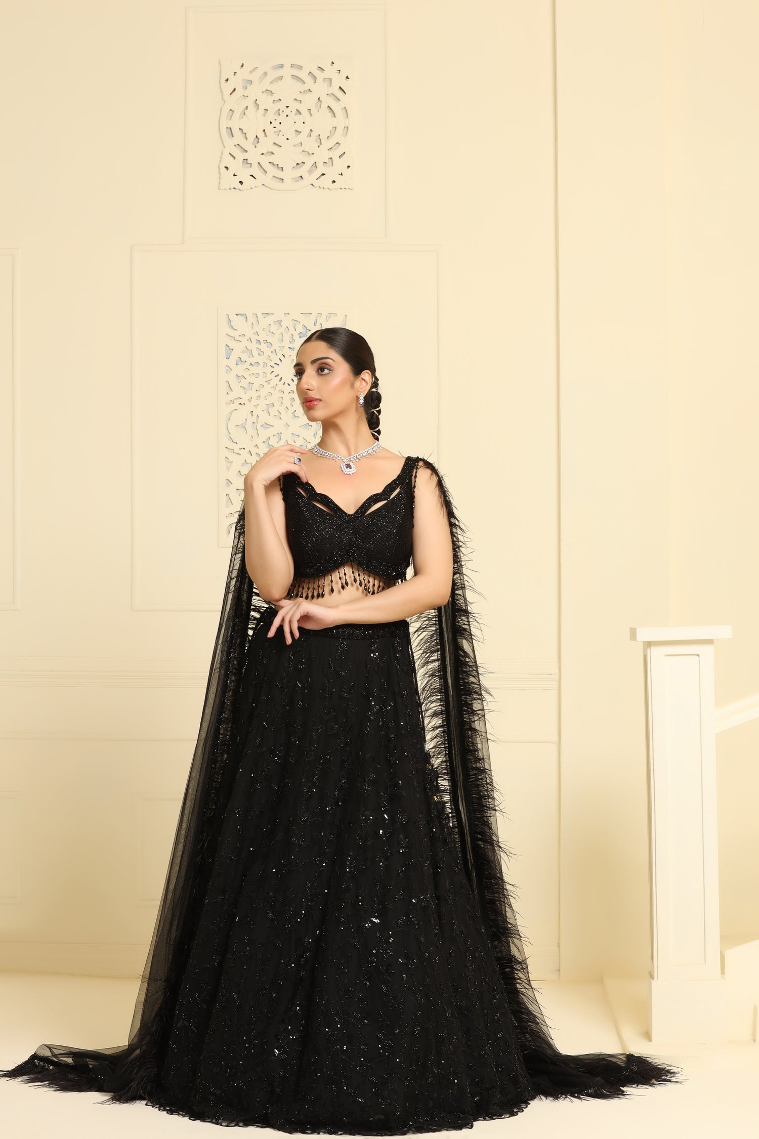 Flower kalidar lehenga and geomatric cutdana work on choli and feather dupatta