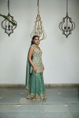Sage green tissue with sequin, bead, resham & moti nature inspired embellishments.